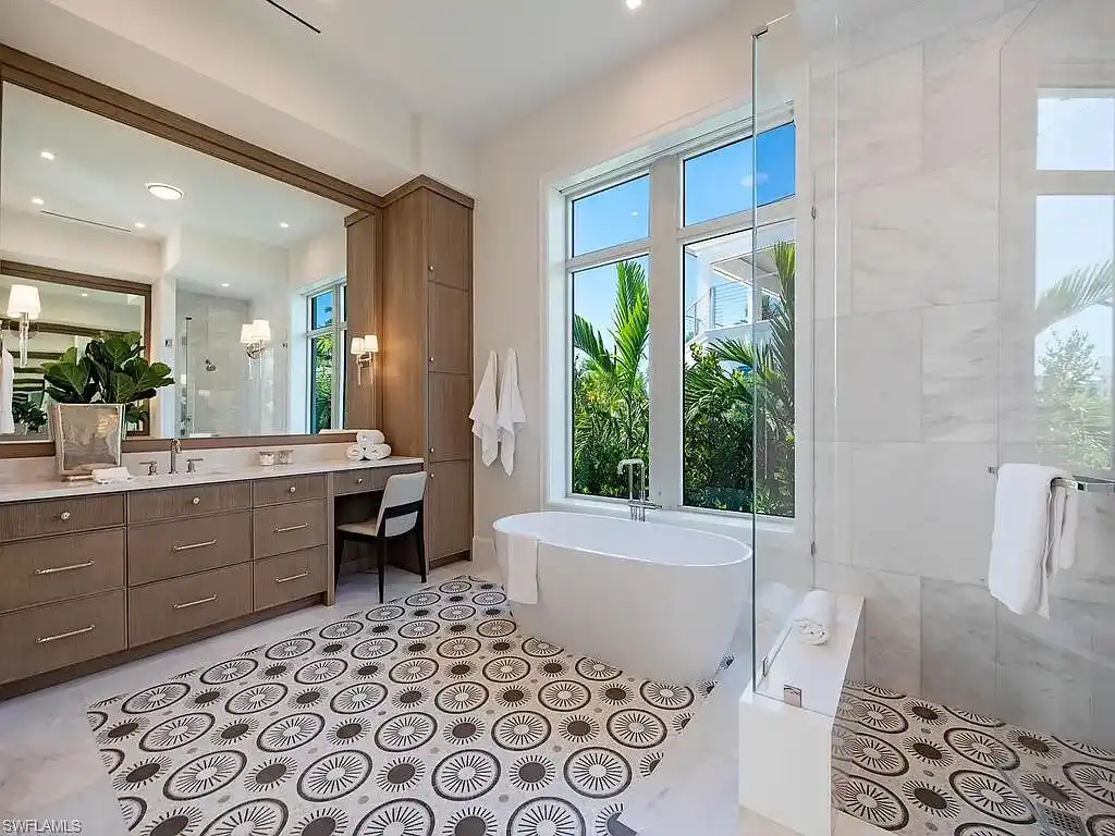 Luxury waterfront home at 306 Spring Line Dr Naples Florida designed by Stofft-Cooney Architects with interiors by Ficarra Design and built by Rise Builders.