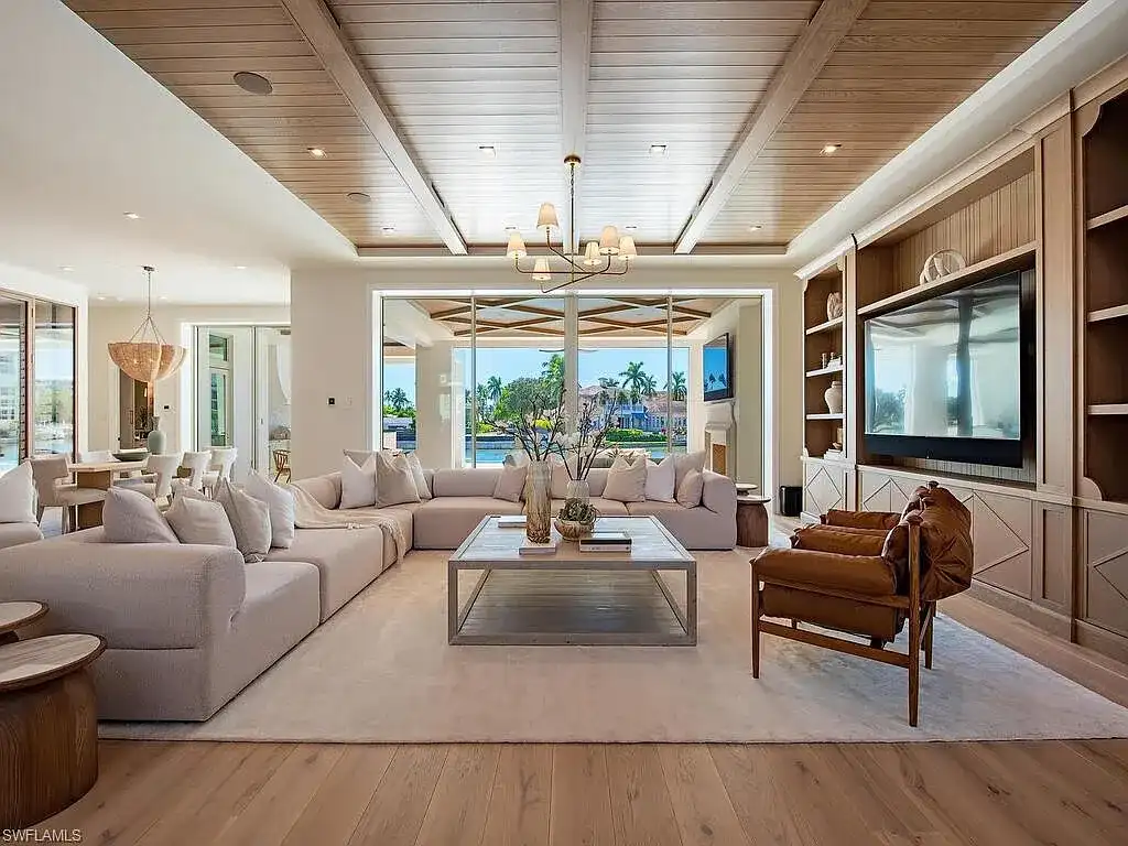 Luxury waterfront home at 306 Spring Line Dr Naples Florida designed by Stofft-Cooney Architects with interiors by Ficarra Design and built by Rise Builders.