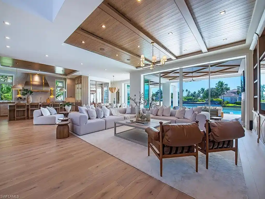 Luxury waterfront home at 306 Spring Line Dr Naples Florida designed by Stofft-Cooney Architects with interiors by Ficarra Design and built by Rise Builders.