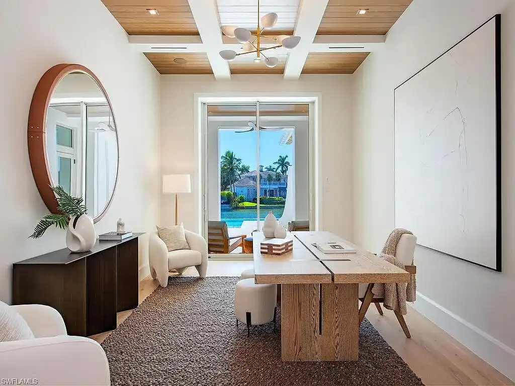 Luxury waterfront home at 306 Spring Line Dr Naples Florida designed by Stofft-Cooney Architects with interiors by Ficarra Design and built by Rise Builders.