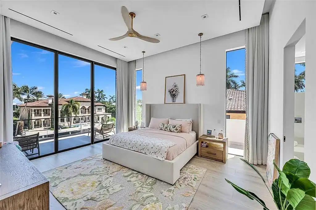 Front exterior view of 408 Coral Way Fort Lauderdale waterfront estate with modern architectural design