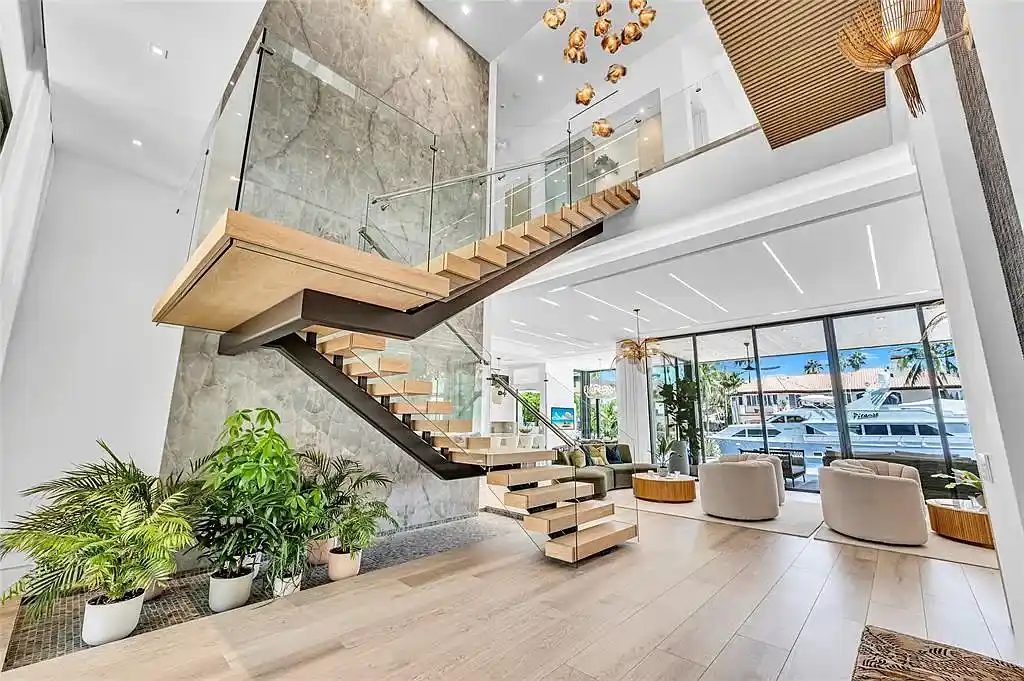 Front exterior view of 408 Coral Way Fort Lauderdale waterfront estate with modern architectural design