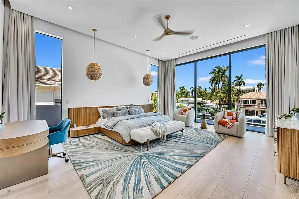 Front exterior view of 408 Coral Way Fort Lauderdale waterfront estate with modern architectural design