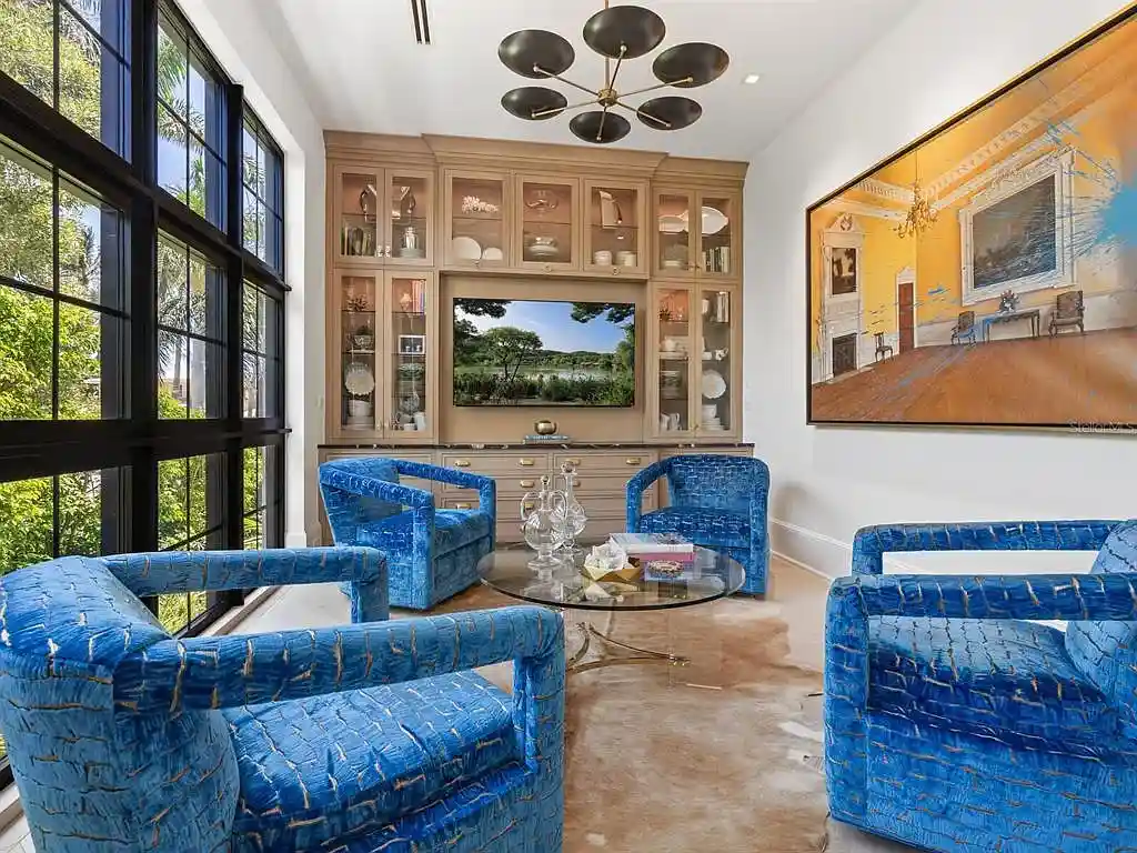 Exterior view of 440 Meadow Lark Dr, Sarasota, a $13.7M waterfront estate with pool, dock, and luxury architectural design