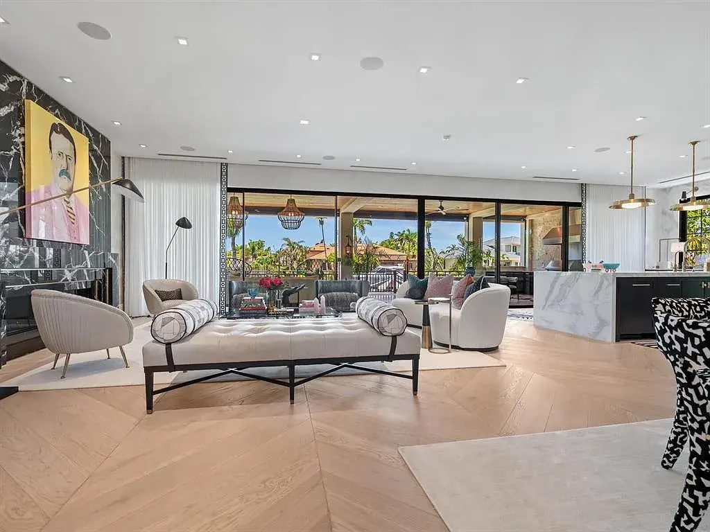 Exterior view of 440 Meadow Lark Dr, Sarasota, a $13.7M waterfront estate with pool, dock, and luxury architectural design