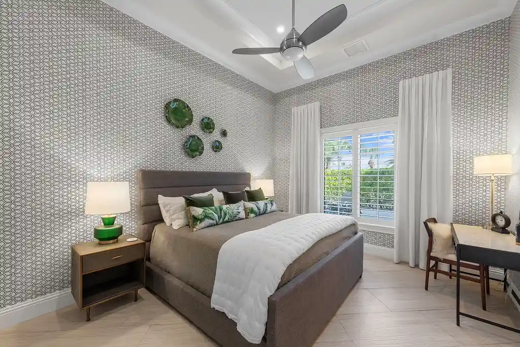 Exterior view of 4517 Brynwood DR Naples FL luxury estate with resort-style pool and landscaped gardens