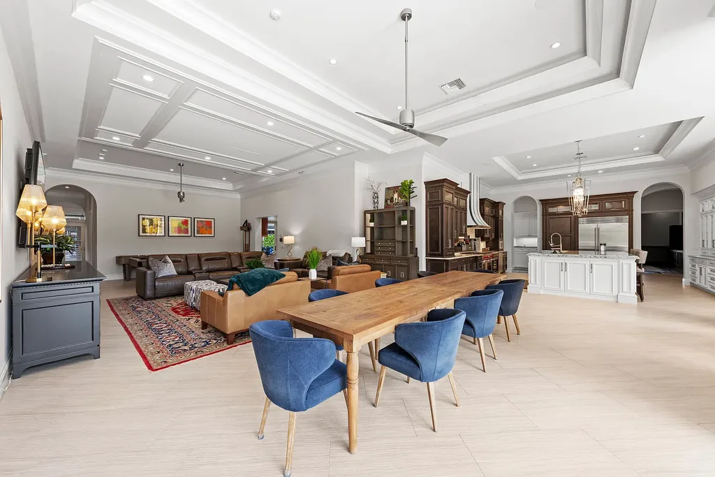 Exterior view of 4517 Brynwood DR Naples FL luxury estate with resort-style pool and landscaped gardens