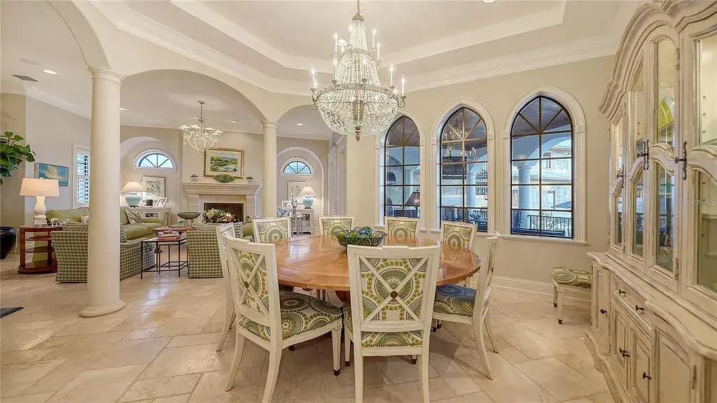 Luxury oceanfront estate at 6001 Gulf Of Mexico Dr in Longboat Key, Florida featuring modern coastal architecture, infinity pool, and panoramic Gulf views, listed for $12 million.