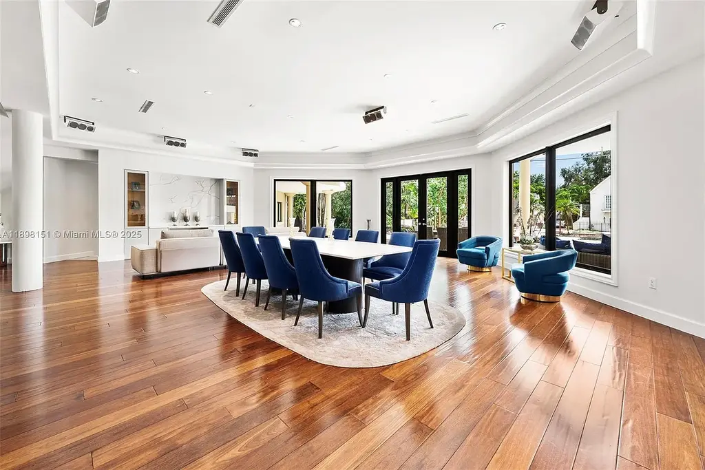 Aerial view of 6700 Granada Blvd, a stunning waterfront Home in Coral Gables for sale with private dock and lush tropical landscape.