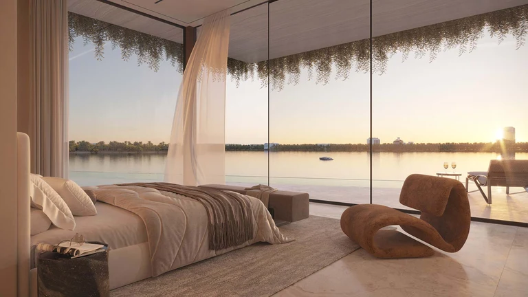 Ocean-view bedroom suite with floor-to-ceiling glass at the most expensive home in Florida.
