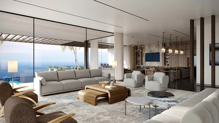 Open-concept living room and kitchen overlooking the Atlantic Ocean inside the Manalapan luxury estate.