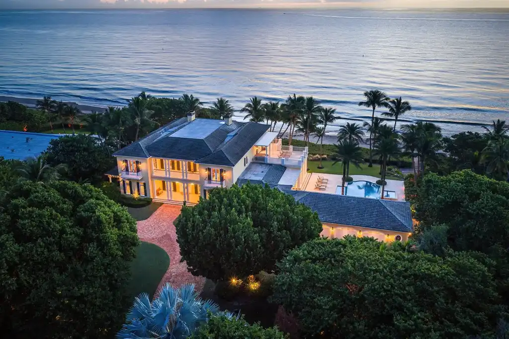 1083 Hillsboro Mile luxury ocean-to-intracoastal estate in Hillsboro Beach, FL featuring 8 bedrooms, 13 bathrooms, private beach, guest house, and expansive pool terrace
