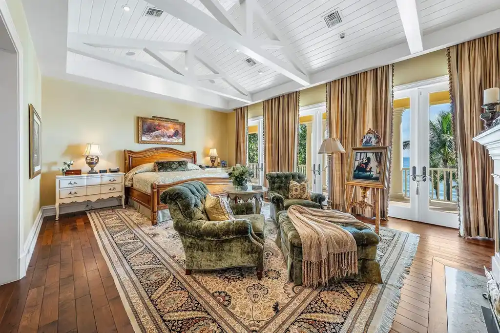 1083 Hillsboro Mile luxury ocean-to-intracoastal estate in Hillsboro Beach, FL featuring 8 bedrooms, 13 bathrooms, private beach, guest house, and expansive pool terrace