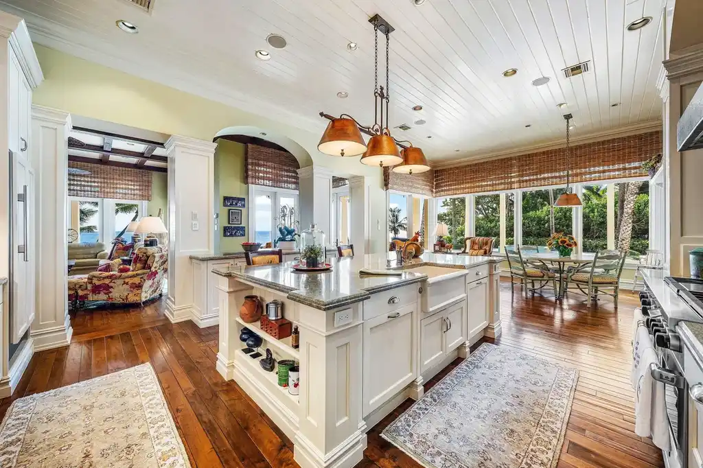 1083 Hillsboro Mile luxury ocean-to-intracoastal estate in Hillsboro Beach, FL featuring 8 bedrooms, 13 bathrooms, private beach, guest house, and expansive pool terrace