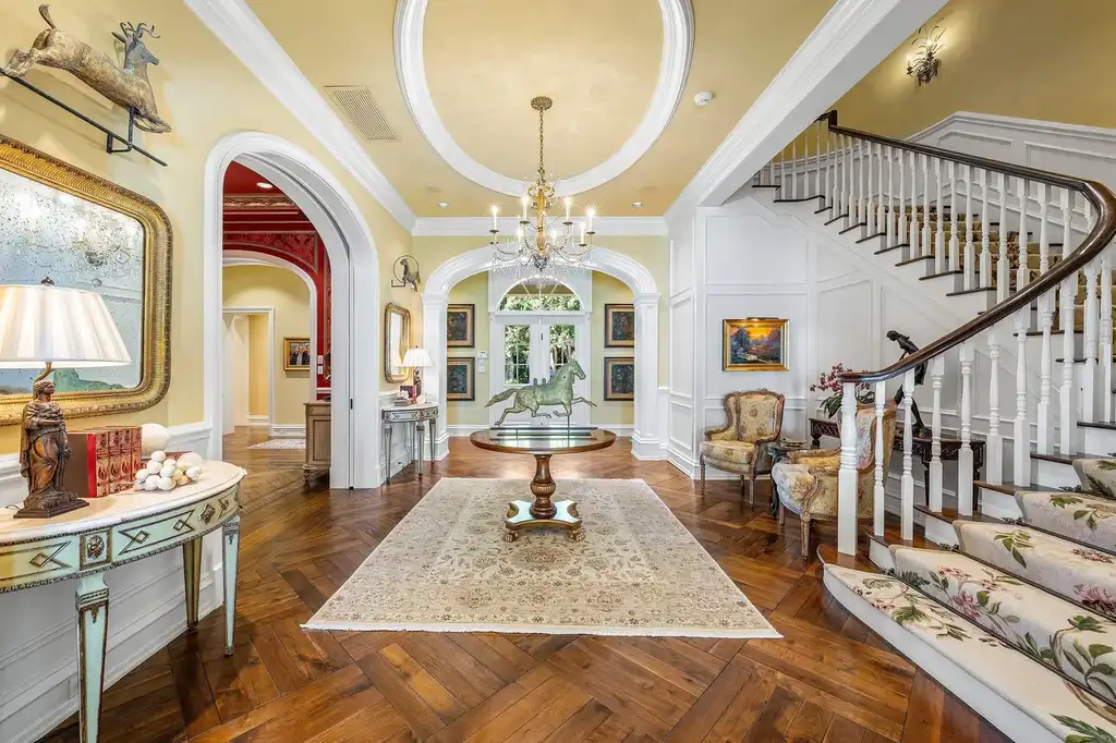 1083 Hillsboro Mile luxury ocean-to-intracoastal estate in Hillsboro Beach, FL featuring 8 bedrooms, 13 bathrooms, private beach, guest house, and expansive pool terrace