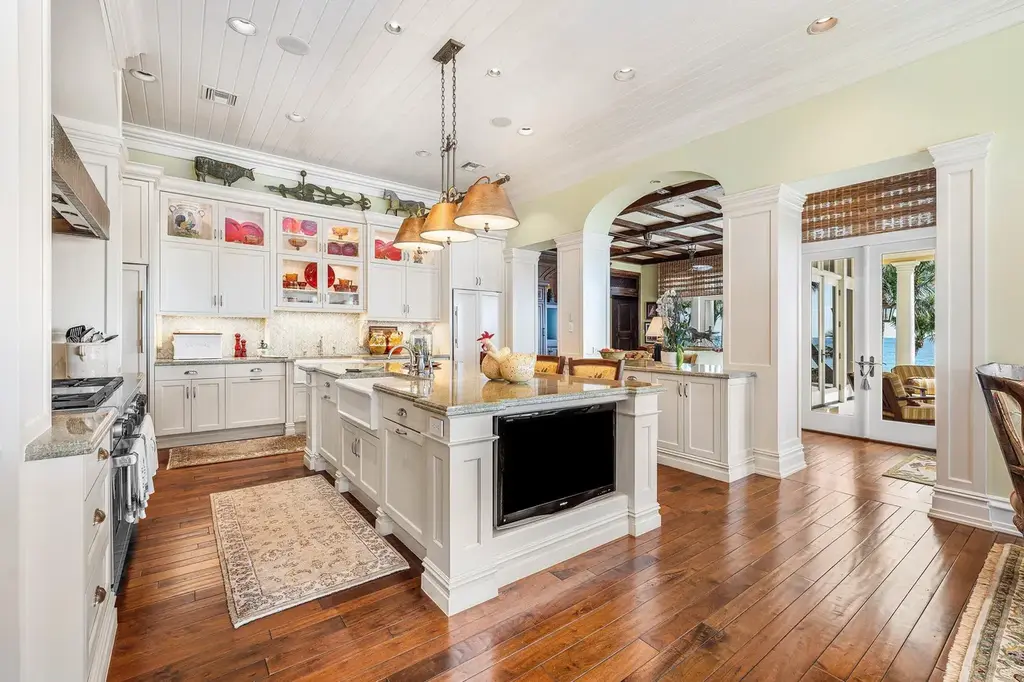 1083 Hillsboro Mile luxury ocean-to-intracoastal estate in Hillsboro Beach, FL featuring 8 bedrooms, 13 bathrooms, private beach, guest house, and expansive pool terrace