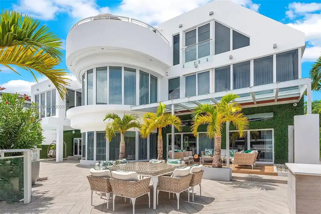 Front view of 1319 Seminole Dr Fort Lauderdale home for sale, showcasing modern waterfront architecture and private driveway.