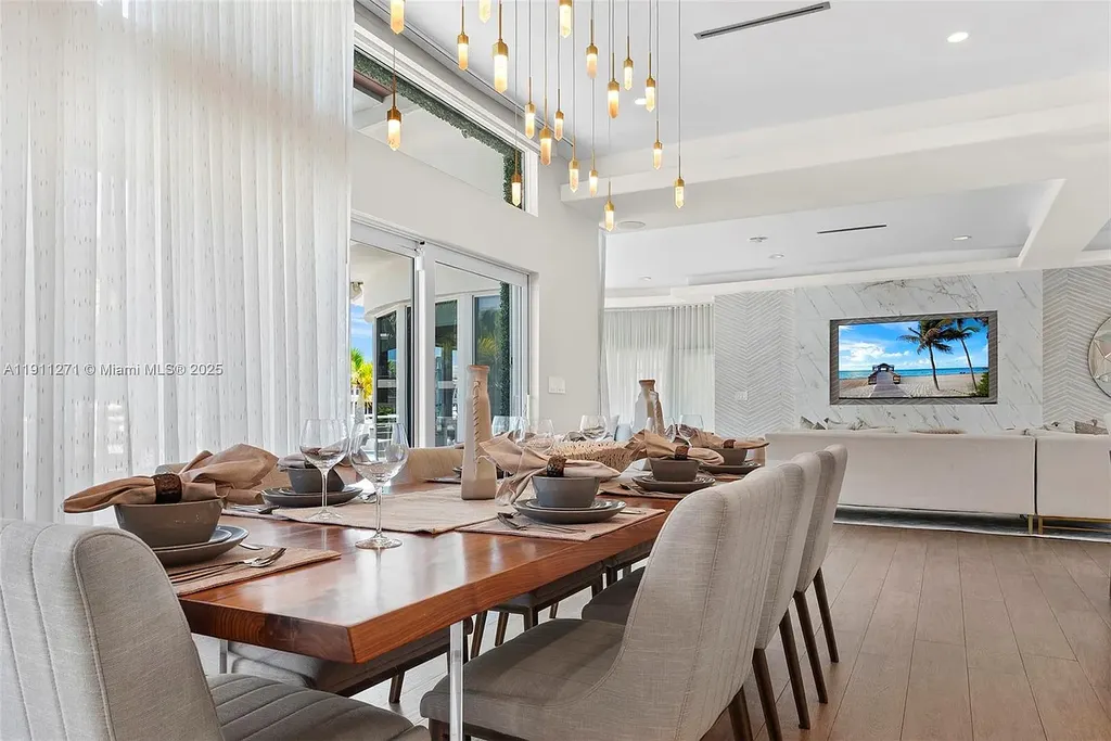 Front view of 1319 Seminole Dr Fort Lauderdale home for sale, showcasing modern waterfront architecture and private driveway.