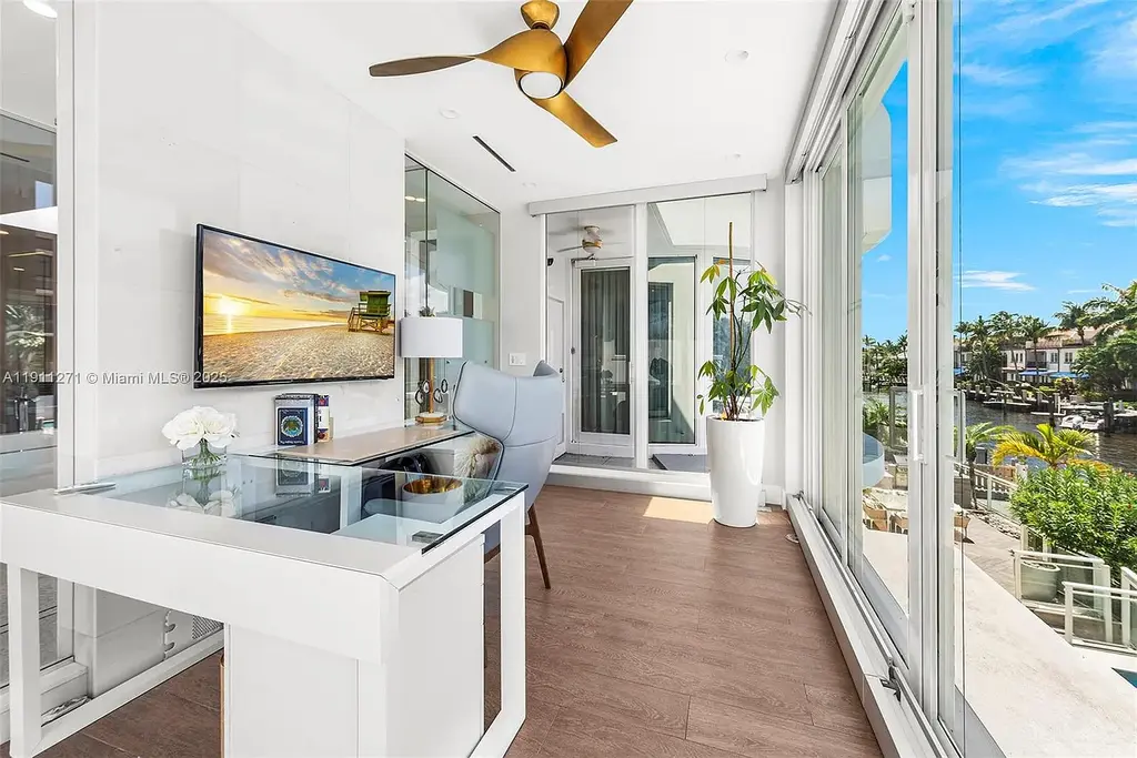 Front view of 1319 Seminole Dr Fort Lauderdale home for sale, showcasing modern waterfront architecture and private driveway.