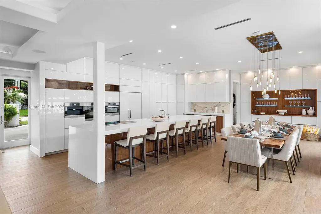 Front view of 1319 Seminole Dr Fort Lauderdale home for sale, showcasing modern waterfront architecture and private driveway.