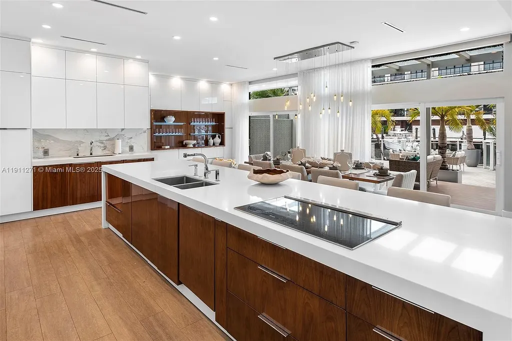 Front view of 1319 Seminole Dr Fort Lauderdale home for sale, showcasing modern waterfront architecture and private driveway.