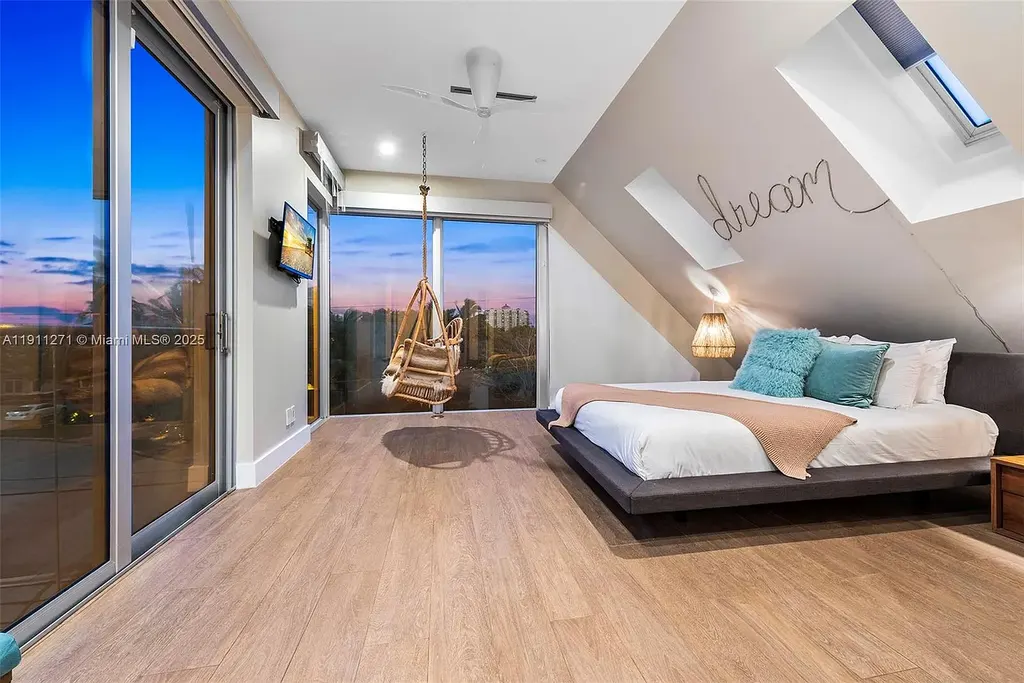 Front view of 1319 Seminole Dr Fort Lauderdale home for sale, showcasing modern waterfront architecture and private driveway.