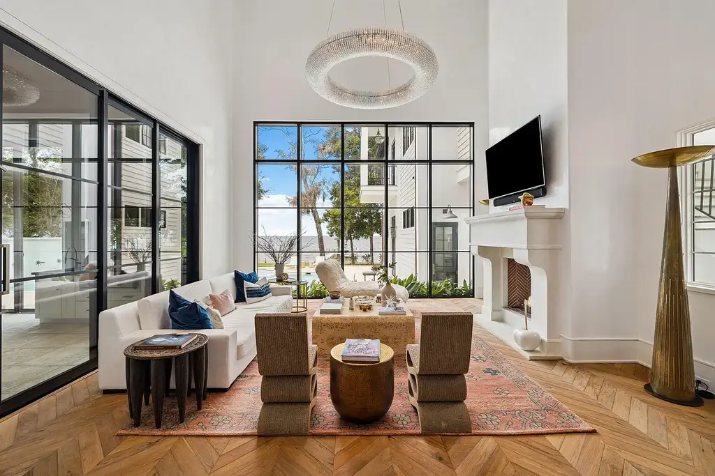 Luxury bayfront estate at 147 Ansley Forest Dr, Santa Rosa Beach, featuring private dock, pool house, 6 bedrooms, 7 bathrooms, and contemporary coastal design with panoramic water views.