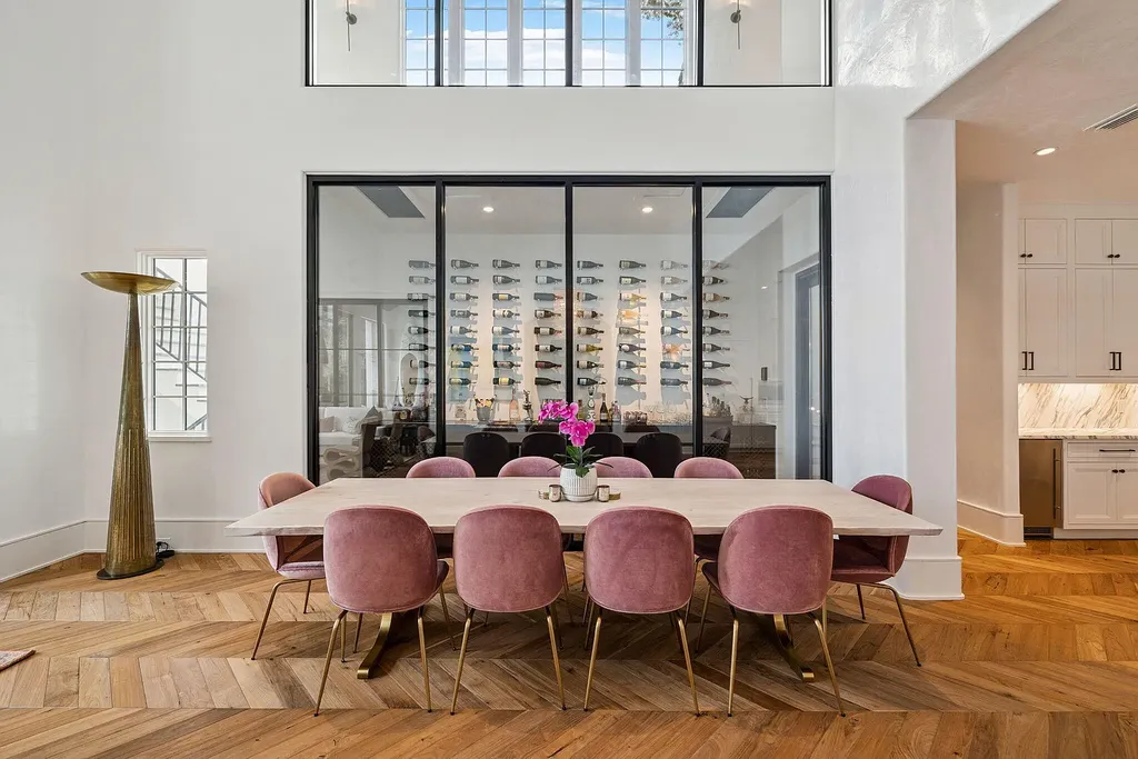 Luxury bayfront estate at 147 Ansley Forest Dr, Santa Rosa Beach, featuring private dock, pool house, 6 bedrooms, 7 bathrooms, and contemporary coastal design with panoramic water views.