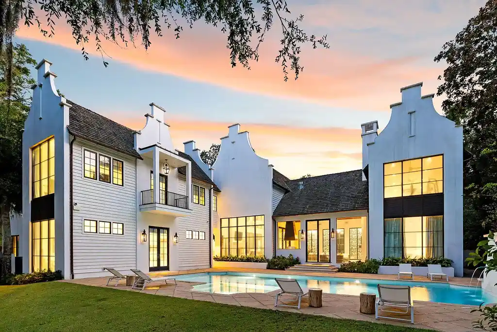 Luxury bayfront estate at 147 Ansley Forest Dr, Santa Rosa Beach, featuring private dock, pool house, 6 bedrooms, 7 bathrooms, and contemporary coastal design with panoramic water views.