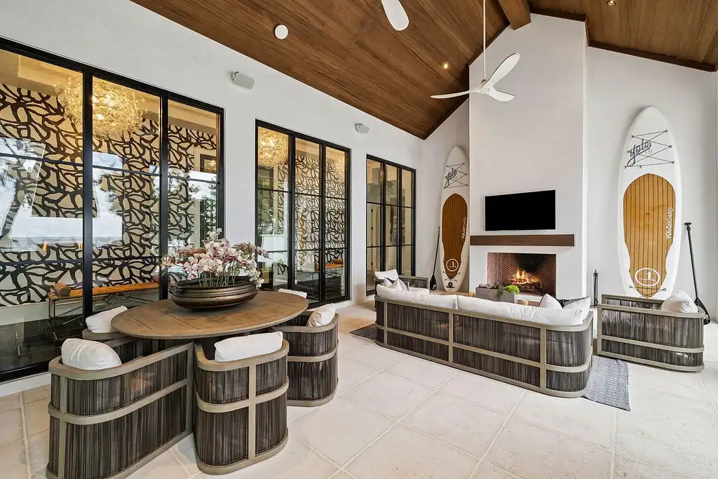 Luxury bayfront estate at 147 Ansley Forest Dr, Santa Rosa Beach, featuring private dock, pool house, 6 bedrooms, 7 bathrooms, and contemporary coastal design with panoramic water views.