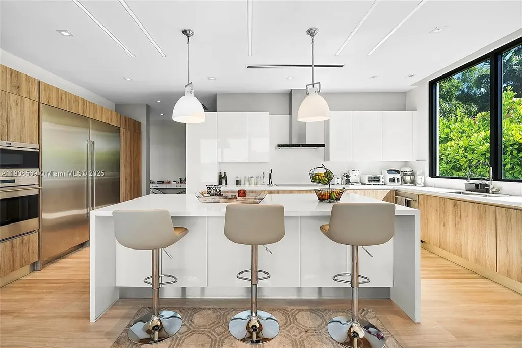 Stunning $16.9 Million Modern Waterfront Estate with Wide Maule Lake Views in North Miami Beach 10 Luxury modern waterfront home at 16470 NE 30th Ave in North Miami Beach featuring wide Maule Lake views, private dock, and sleek contemporary design.