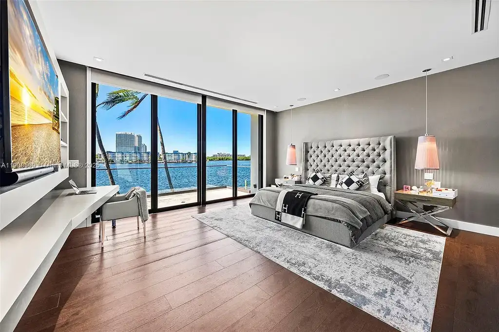 Stunning $16.9 Million Modern Waterfront Estate with Wide Maule Lake Views in North Miami Beach 13 Luxury modern waterfront home at 16470 NE 30th Ave in North Miami Beach featuring wide Maule Lake views, private dock, and sleek contemporary design.