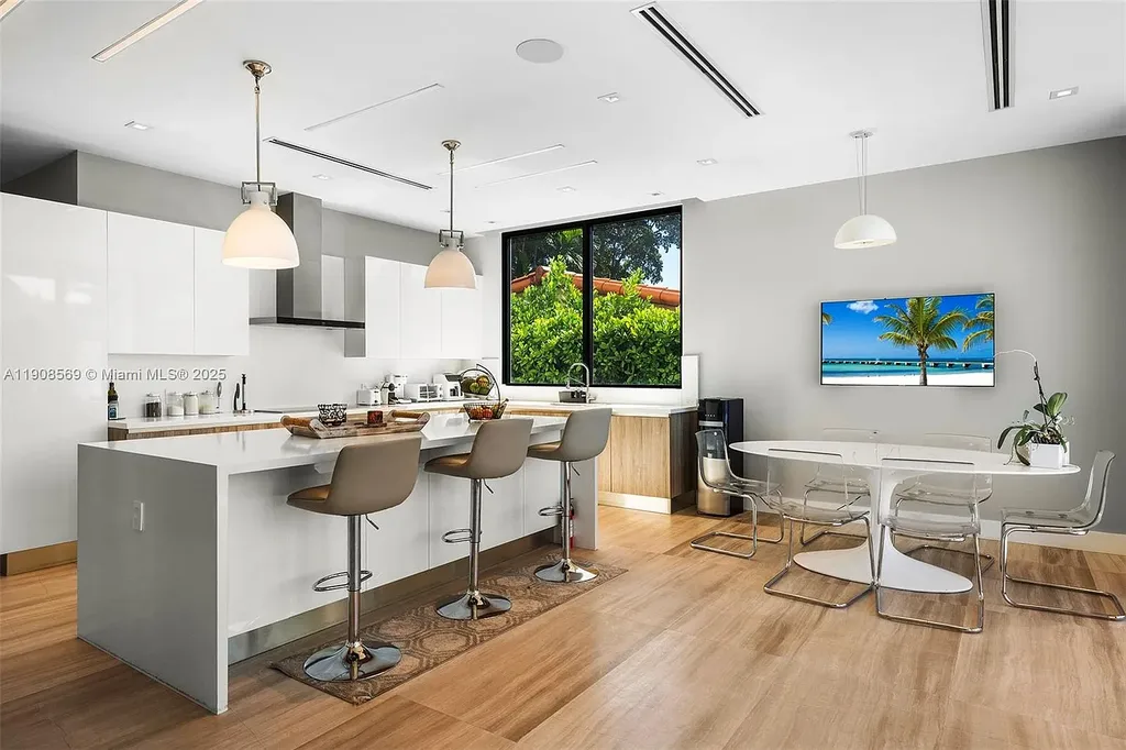 Stunning $16.9 Million Modern Waterfront Estate with Wide Maule Lake Views in North Miami Beach 9 Luxury modern waterfront home at 16470 NE 30th Ave in North Miami Beach featuring wide Maule Lake views, private dock, and sleek contemporary design.