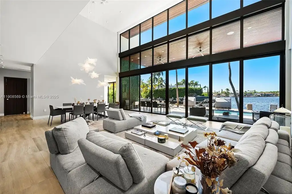 Stunning $16.9 Million Modern Waterfront Estate with Wide Maule Lake Views in North Miami Beach 6 Luxury modern waterfront home at 16470 NE 30th Ave in North Miami Beach featuring wide Maule Lake views, private dock, and sleek contemporary design.