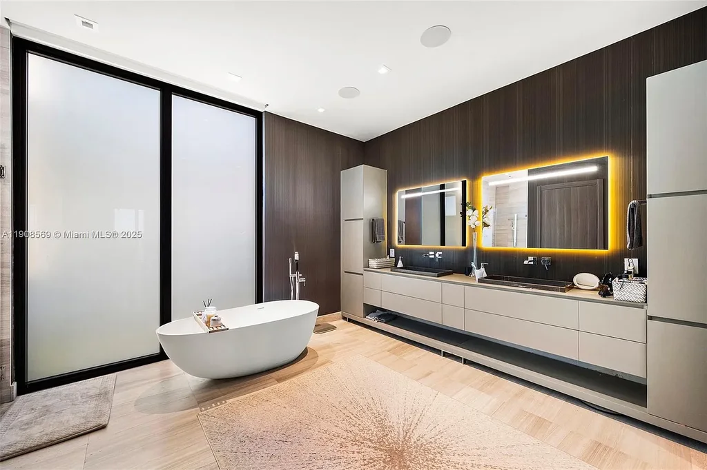 Stunning $16.9 Million Modern Waterfront Estate with Wide Maule Lake Views in North Miami Beach 14 Luxury modern waterfront home at 16470 NE 30th Ave in North Miami Beach featuring wide Maule Lake views, private dock, and sleek contemporary design.