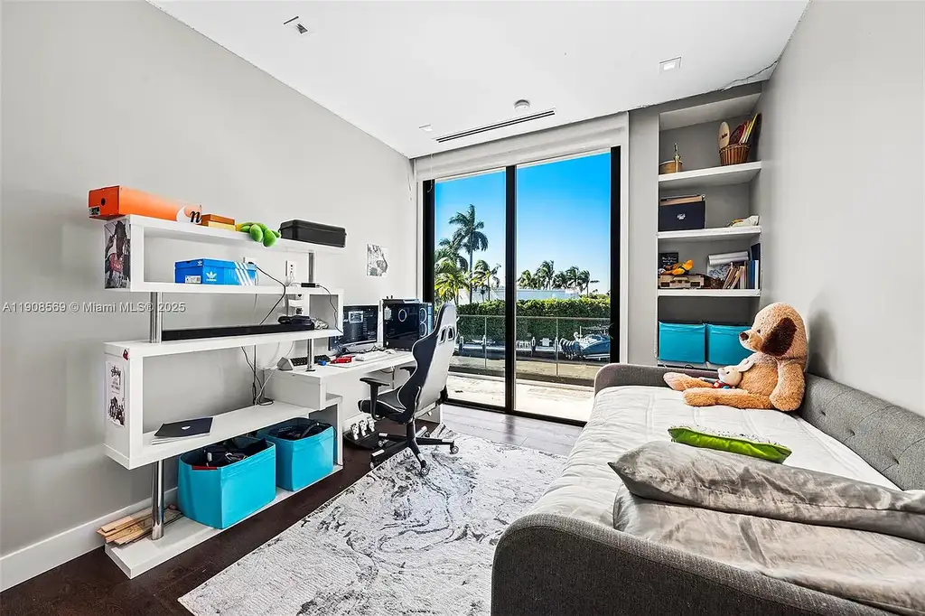 Stunning $16.9 Million Modern Waterfront Estate with Wide Maule Lake Views in North Miami Beach 12 Luxury modern waterfront home at 16470 NE 30th Ave in North Miami Beach featuring wide Maule Lake views, private dock, and sleek contemporary design.