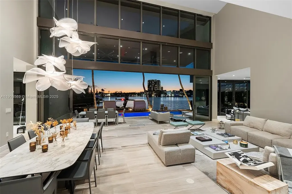 Stunning $16.9 Million Modern Waterfront Estate with Wide Maule Lake Views in North Miami Beach 7 Luxury modern waterfront home at 16470 NE 30th Ave in North Miami Beach featuring wide Maule Lake views, private dock, and sleek contemporary design.