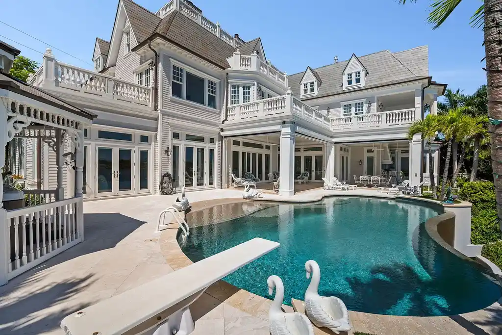 Anglesea Estate at 17667 SE Federal Highway, Jupiter FL, Luxury waterfront home with heated pool, private dock, and elevated Intracoastal views