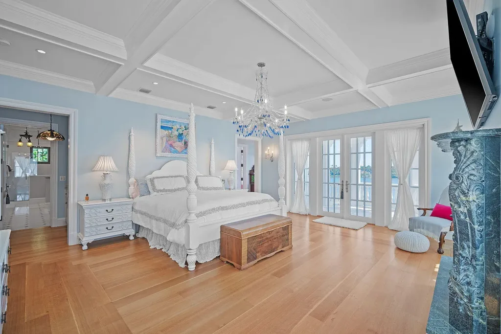 Anglesea Estate at 17667 SE Federal Highway, Jupiter FL, Luxury waterfront home with heated pool, private dock, and elevated Intracoastal views