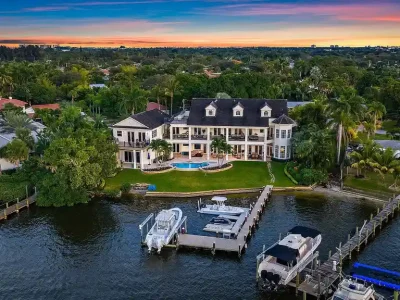 18137 Palm Point Drive A 11.5 Million Jupiter Estate Offering Elevated Riverfront Architecture and Rare Florida Serenity 1