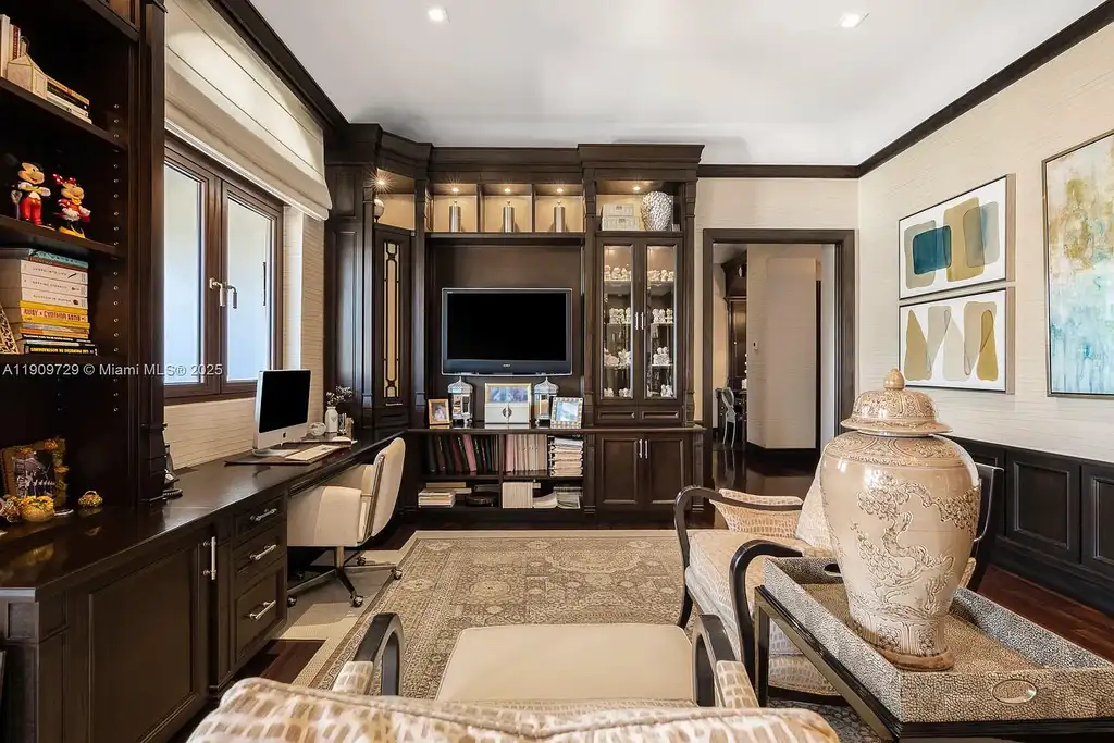 Luxury waterfront estate at 210 Palm Ave Miami Beach with infinity pool, private dock, modern finishes, and panoramic bay views