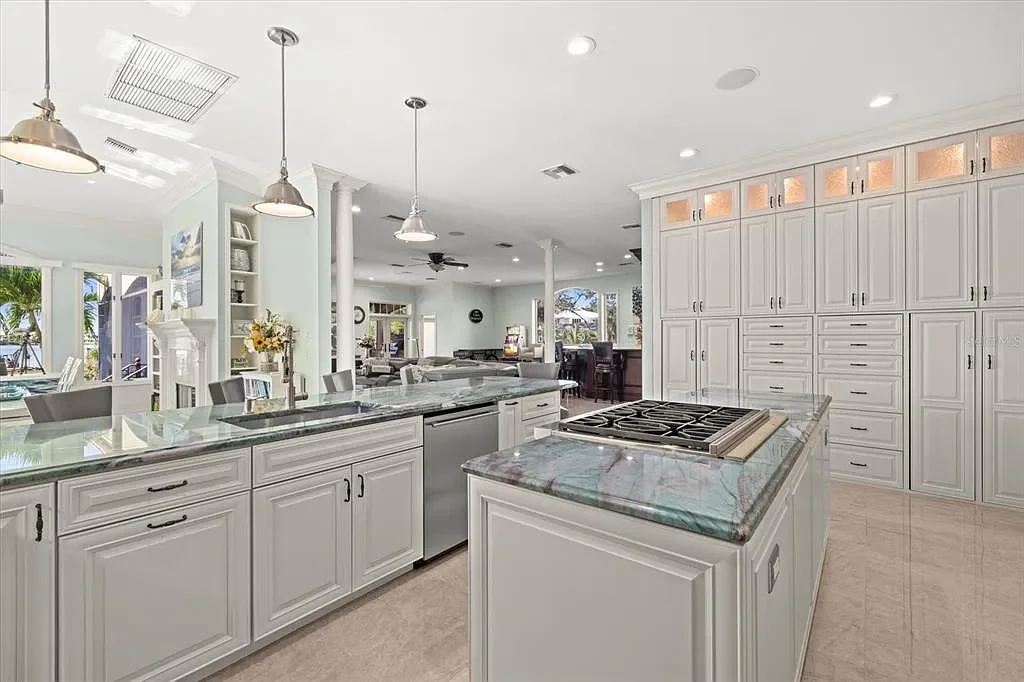 Aerial view of luxurious Nokomis Home for sale with deep-water dock and bay access