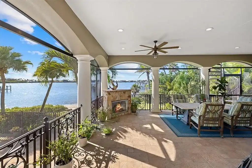 Aerial view of luxurious Nokomis Home for sale with deep-water dock and bay access