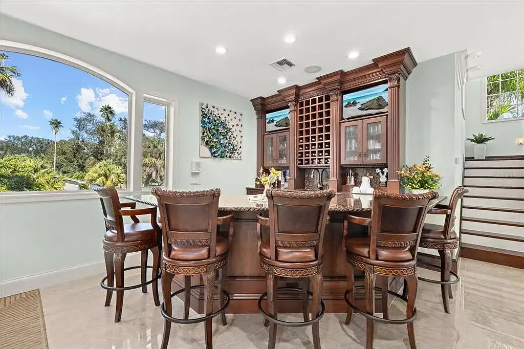 Aerial view of luxurious Nokomis Home for sale with deep-water dock and bay access