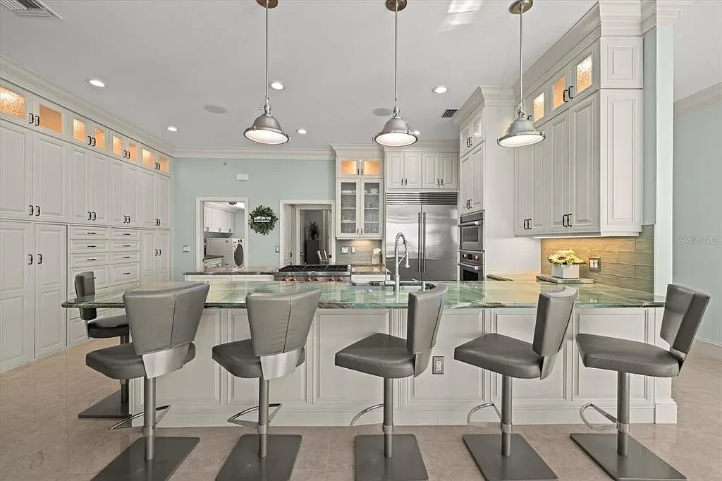 Aerial view of luxurious Nokomis Home for sale with deep-water dock and bay access