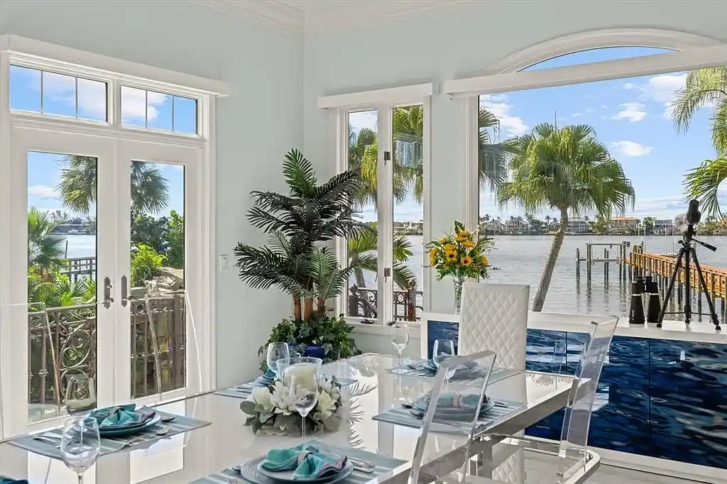 Aerial view of luxurious Nokomis Home for sale with deep-water dock and bay access