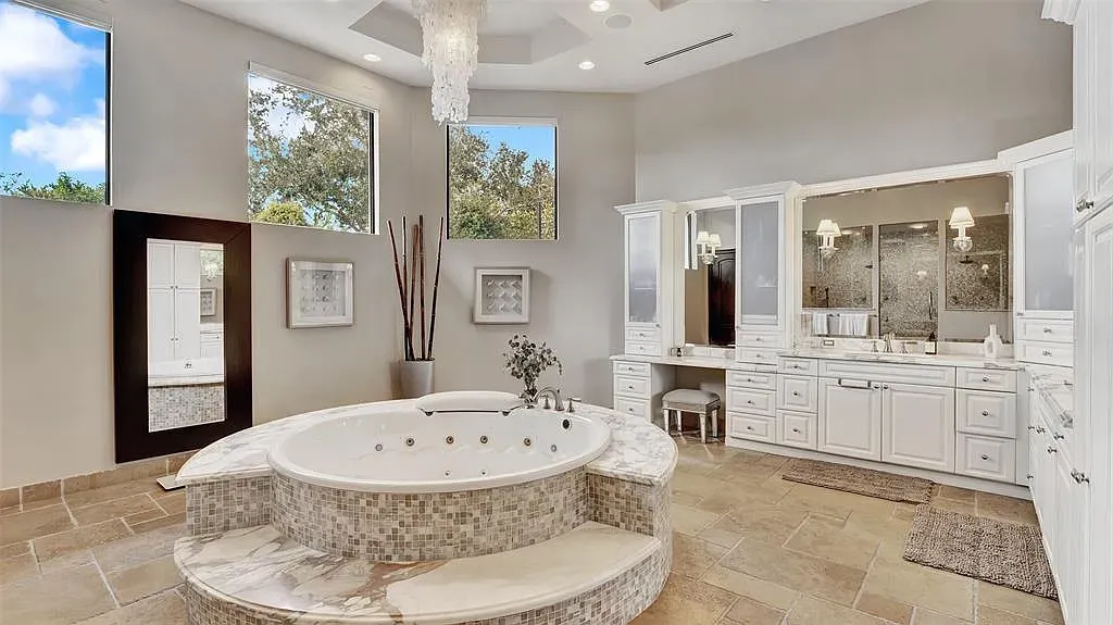 $9.7 Million Spectacular Weston Waterfront Estate with Resort-Style Amenities and Panoramic Lake Views 11 3530 Windmill Ranch Rd Weston $9.7M luxury waterfront estate with 7 bedrooms, 10 bathrooms, resort-style pool, and panoramic lake views