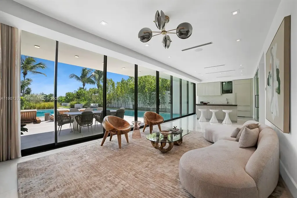 $40 Million Oceanfront Miami Beach Estate with Rooftop Terrace and Saltwater Pool 15 Oceanfront primary suite at 7845 Atlantic Way featuring private terrace, spa bath, and panoramic Atlantic views