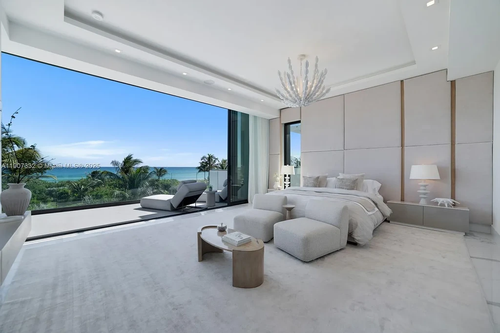 $40 Million Oceanfront Miami Beach Estate with Rooftop Terrace and Saltwater Pool 11 Oceanfront primary suite at 7845 Atlantic Way featuring private terrace, spa bath, and panoramic Atlantic views