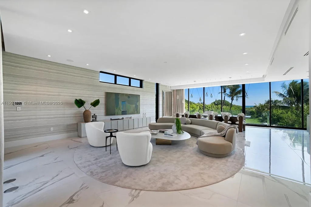 $40 Million Oceanfront Miami Beach Estate with Rooftop Terrace and Saltwater Pool 6 Oceanfront primary suite at 7845 Atlantic Way featuring private terrace, spa bath, and panoramic Atlantic views